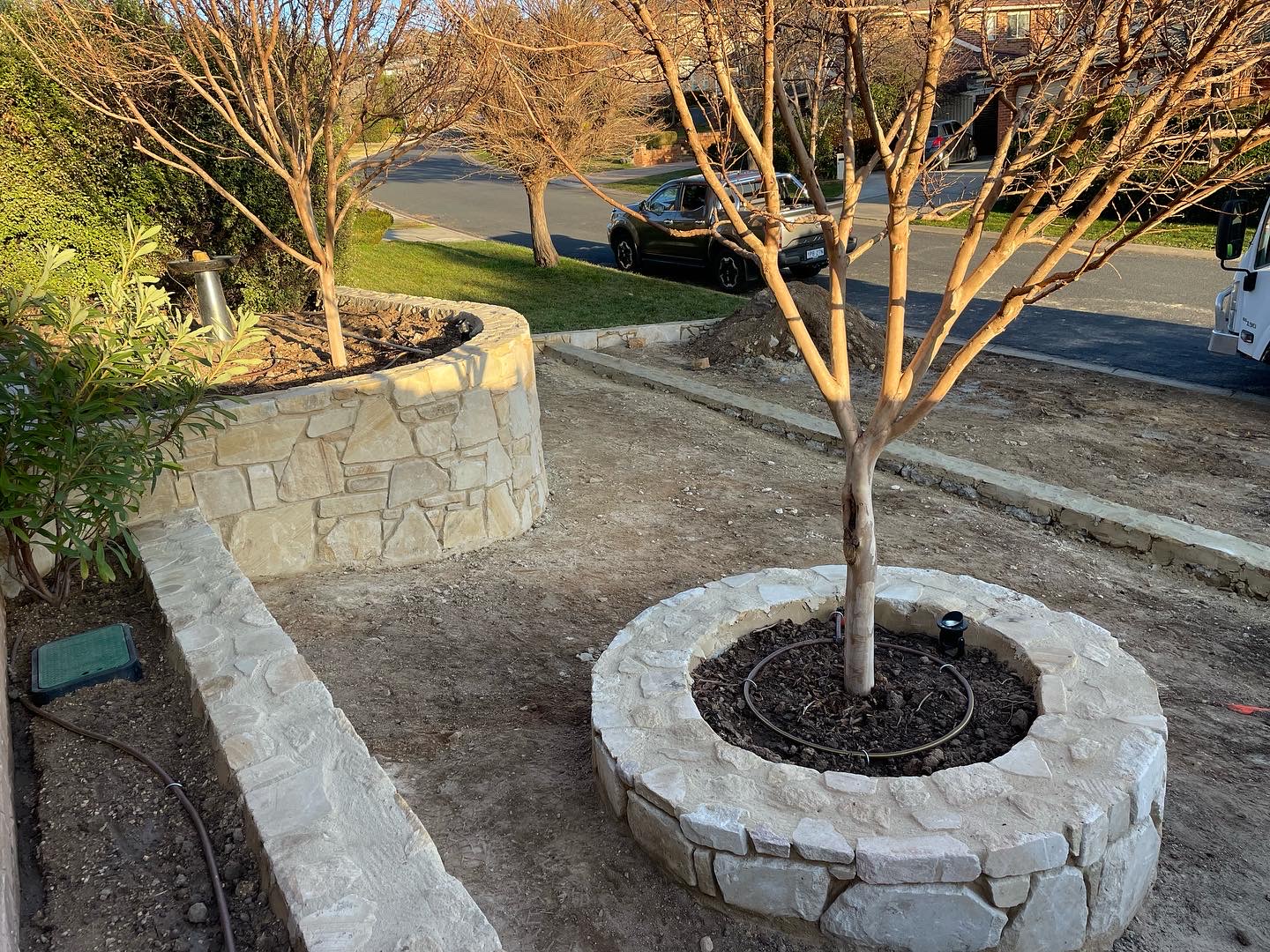 Curved sandstone planter